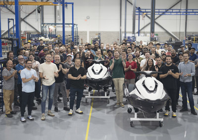 The Taiga team celebrates its first 100% electric personal watercrafts, the Orcas coming off the production line. (CNW Group/Taiga Motors Corporation)