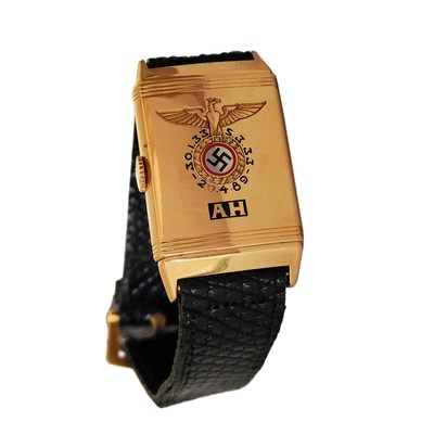 Adolf Hitler's gold Huber reversible wristwatch, presented to him by the Nazi Party in 1933. The watch was discovered by a French soldier in the ruins of Hitler's vacation retreat at Berchtesgaden and has remained in his family ever since. The other side of the case, which can be rotated, displays the time. To be offered at auction by Alexander Historical Auctions in Maryland, U.S.A. August 28, 2022.