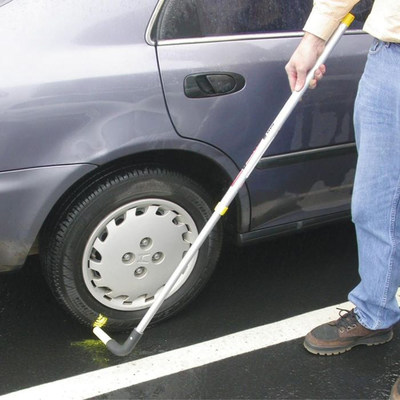 Using a Chalk Stick Tire Marker for parking enforcement. Photo - Pacific Cascade Corporation