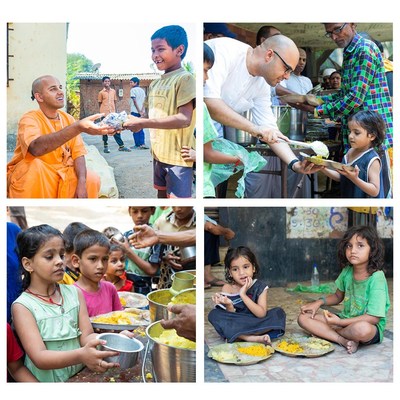 Caitanya Avatar Das and Narottam Priya Das from ISKCON Bhiwandi distributing Hot cooked meals to one and all. (PRNewsfoto/ISKCON Bhiwandi)