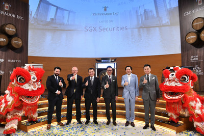 Representatives of Emperador Inc., the Embassy of Singapore in Manila and SGX strike the gong in celebration of Emperador Inc.'s secondary listing on the Main Board of the SGX-ST (From left to right: George Schulze, Dalmore Whisky Expert for Asia - Emperador Inc.; Bryan Donaghey, CEO of Whyte & Mackay and Head of Whisky Business of Emperador Inc.; Loh Boon Chye, CEO of Singapore Exchange; Dr. Andrew L. Tan, Director and Chairman of the Board of Emperador Inc.; Ambassador Gerard Ho, Embassy of Singapore in Manila; and Kevin Andrew L. Tan, Director of Emperador Inc.)