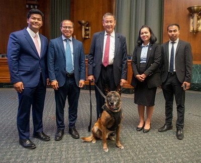 Ambassador of the Kingdom of Cambodia to the United States H.E. Keo Chhea and MDD Rico, a recently retired mine detection dog who helped The Marshall Legacy Institute clear over 600,000 square meters of land in Bosnia & Herzegovina