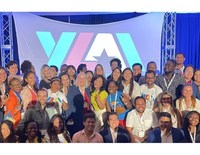 Stacy White (center left) and Nina Vaca (center right) surrounded by YLAI Fellows