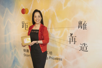 Helena Chen, Managing Director, Hong Kong and Macau, Mastercard, creating a dreamcatcher using tie-dyed repurposed fabric from office supplies in a garment upcycling workshop organized by the company in 2021. All proceeds from the workshop were donated to the Priceless Planet Coalition.
