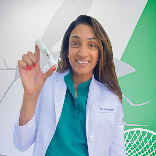 Medical Advisor Dr. Mona Amin holding Bug Bite Thing