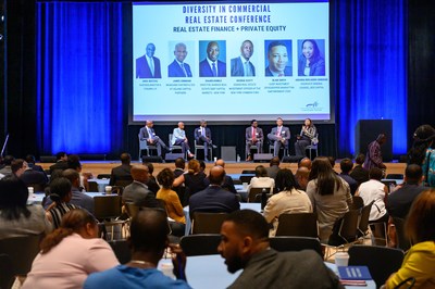 Diversity in Commercial Real Estate Conference attendees participating in an engaging mainstage industry session.