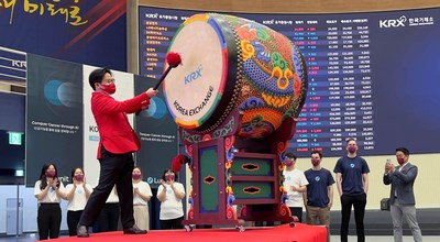 Brandon Suh, CEO of Lunit, beating a drum in celebration of the Initial Public Offering at the Korean Exchange, Thursday, July 21, 2022.