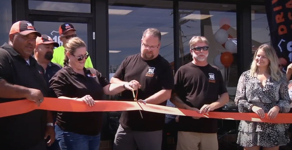 The 160 Driving Academy Ohio River Valley Leadership Team Celebrates the Official Ribbon Cutting Ceremony for the Charleston, WV location.