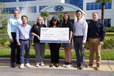 (left to right)  Robert Burns, chief administrative officer, Hyundai Motor Manufacturing Alabama, Ethan Kim, vice president and executive coordinator, Hyundai Motor Manufacturing Alabama, Marie Crew, director, health education and safety center, Children’s of Alabama, Dana W. White, chief communications officer, Hyundai Motor North America, Ashley Bridgmon, coordinator, research and technology, Children’s of Alabama, Jaeho Yoon, senior manager, general affairs and PR, Hyundai Motor Manufacturing Alabama and Michael Knopf, senior manager, quality assurance, Hyundai Motor Manufacturing Alabama in Montgomery, Ala. on July 30, 2022. (Photo/Hyundai)