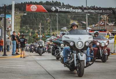 Rockford Fosgate banners greet motorcyclists as they roll down Junction Avenue during the the 2021 Sturgis® Motorcycle Rally™