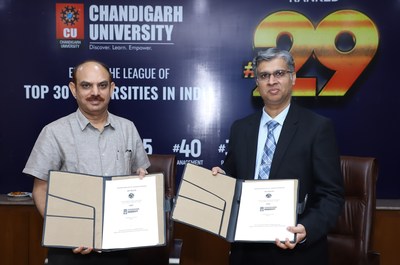 Prof (Dr) Anand Agarwal, Vice-Chancellor, Chandigarh University and Dr Brijendra Pateriya, Director, PRSC, Punjab Agricultural University (PAU) campus, Ludhiana holding the copies of MoUâ€™s.