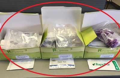 Counterfeit kits – three open boxes

Each box has varying contents, including varying test cassettes and assay buffers. (CNW Group/Health Canada)