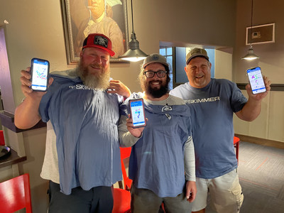 IPSSA Secretary Justin Stuard, Nick Belury, and President Mark Mastropietro show off Skimmer at a recent IPSSA Austin chapter meeting.