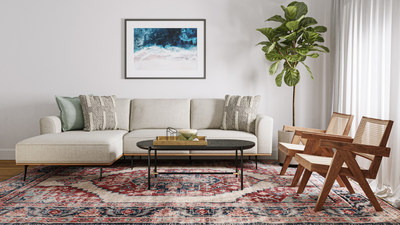 An Oliver Space-furnished room featuring the Gaudi Sectional in Cream, Duval Coffee Table, and Grace Accent Chair.