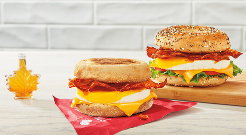 Two classic Canadian flavours come together to create the NEW Tim Hortons Maple Bacon Breakfast Sandwiches, featuring our crispy smoked bacon with a sweet and savoury glaze that’s made with 100% Canadian Maple Syrup (CNW Group/Tim Hortons) Two classic Canadian flavours come together to create the NEW Tim Hortons Maple Bacon Breakfast Sandwiches, featuring our crispy smoked bacon with a sweet and savoury glaze that’s made with 100% Canadian Maple Syrup (CNW Group/Tim Hortons)