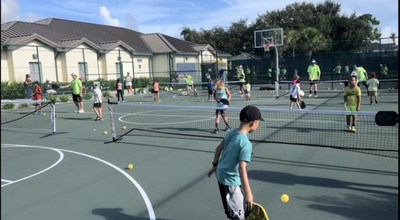 The First Dink Foundation successful first event! Thank you for everyone who came out  for our inaugural "Pickle Ball 101" youth clinic! (PRNewsfoto/The First Dink Foundation)