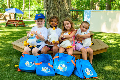 l. to r. Sunrise Day Camp campers Declan Maroney, Samira Zanelli, Samantha Pascarella and Marlee Willett, all 5 years old from Long Island, NY hug their My Special Aflac Ducks given to them by Aflac. Today, Aflac delivered more than 150 My Special Aflac Ducks to children and families coping with childhood cancer at the camp in Wheatley Heights.