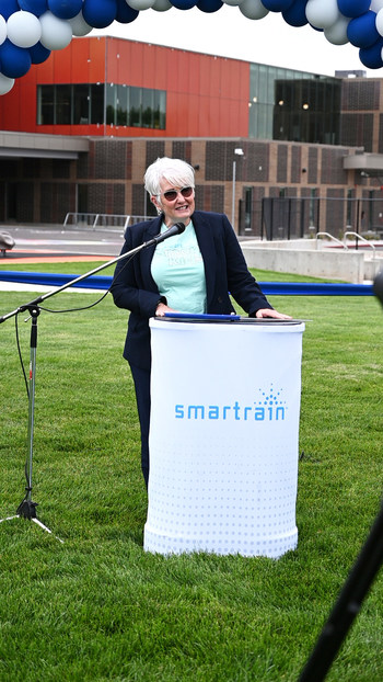 Smart Rain's Foundation Director, Julie Larsen speaking at Aug 10, 2022 event at Liberty Elementary School in Ogden Utah explaining the Smart Rain for Smart Kids program.