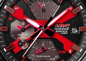 X on dial with paint used for the red Honda badge