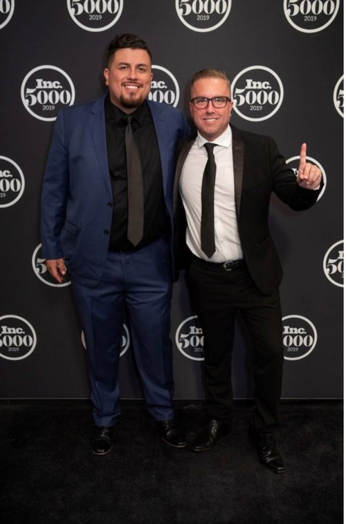 SkillsetGroup founder and CEO Clint Armstrong (right) poses at an Inc. 5000 event with SkillsetGroup CMO Jose Baca. SkillsetGroup's inclusion on the 2022 Inc. 5000 list marks the fourth time Inc. has recognized the company.