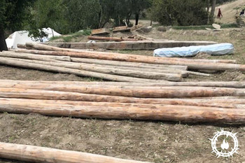 Just a few of the many new beams to replace broken ones from the latest earthquake that have ravaged some of the poorest areas of Afghanistan.