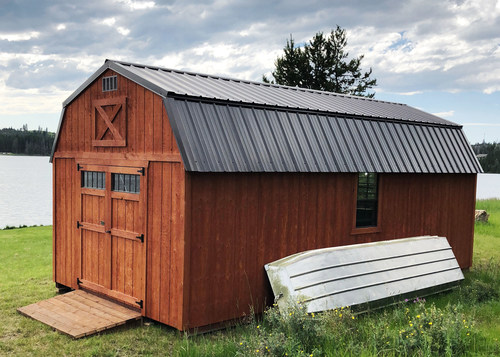 portable lofted barn nestled beside peaceful Montana lake