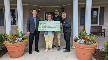 In the photo, Ryan Elinkowski, director of St Jude House, Buffy Adams, director of development of St Jude House, Allyn Hane, president of Yard Mastery Inc and Josh Whitford, co-founder of Yard Mastery Inc.