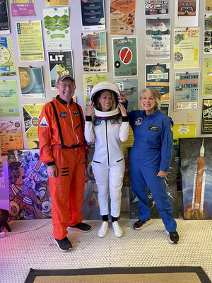 Chad Emerson (left), departing CEO and President of Downtown Huntsville, Inc, promoting Artemis on the Square, a free community event celebrating NASA’s Artemis program in November 2021. Left to Right: Emerson, Jessica Sanders (Director, Marketing, Communication & Strategic Integration at Teledyne Brown), and Marcia Lindstrom (Strategic Communications Team Lead for NASA's Space Launch System, the SLS).