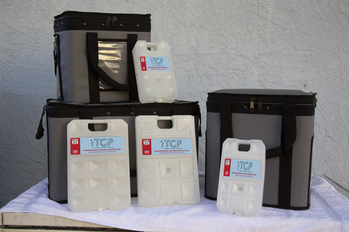 Phase change material cold packs replace dry ice when used in an insulated totes.