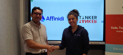Akmal Abdul Rahman (left), Director of TinkerTanker and Varsha Jagdale (right), General Manager of Financial Services in Affinidi, seals their collaboration with a handshake.