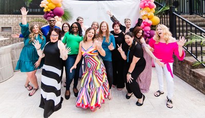 Melissa Henault, Founder of Burnout To All Out with fellow female entrepreneurs at a business training event