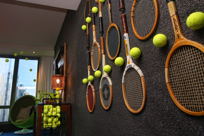 The IHG Hotels & Resorts Racquet Room with racquet lined wall décor