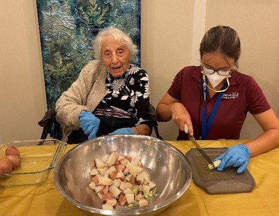 Residents and associates of Pelican Landing Assisted Living and Memory Care team up for the annual Great Duo Cook-Off.  The culinary challenge celebrates the favorite recipes of each resident as part of their Personal Life Silhouettes program.