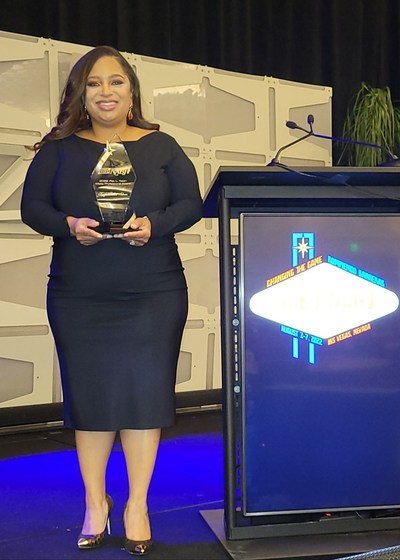 Public relations executive, Kayla Tucker Adams, receiving the 2022 Patricia L. Tobin Media Professional Award at the National Association of Black Journalists (NABJ) Hall of Fame Luncheon in Las Vegas