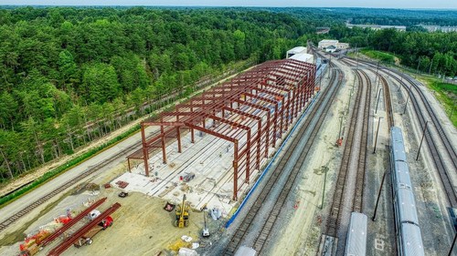 Over the past months, crews have excavated more than 64,000 cubic yards of soil, placed 2,600 cubic yards of concrete, installed 5,300 linear feet of new track, and erected 40 tons of steel to bring the facility to full height.