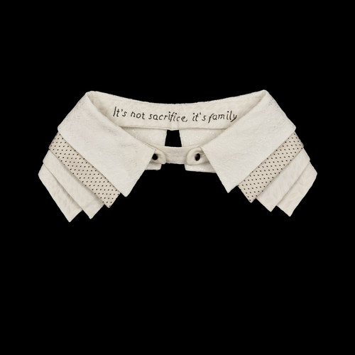 One of Judge Ginsburg's famous necklaces, embroidered with 'It's not a sacrifice, it's a family', a quote from her late husband, Marty Ginsburg, will be auctioned off by Bonhams to help establish the RBG endowment fund for SOS Children's Villages.