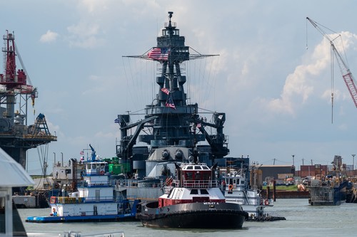 The Battleship Texas in the Galveston Harbor preparing to dock; ©2022 Jennifer Lake. All rights reserved.