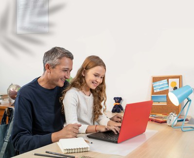 A father and his daughter having fun on the family Nokia PureBook Lite