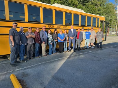 Mercer County Schools Superintendent Ed Toman, Transportation Director Dave Rose, West Virginia dealer representative Steve Ellis and GreenPower's Vice President Mark Nestlen along with bus drivers and mechanics for the district upon receiving the BEAST all-electric Type D school bus.