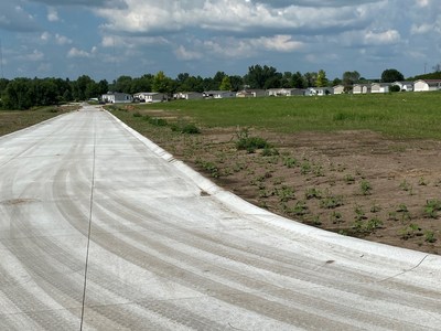 The expansion at West Branch Village includes newly installed concrete roads.