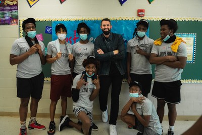 Kevin Love visiting students at a local school in Cleveland, Ohio to see the curriculum in action and participate in one of the lessons.