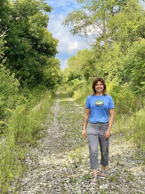 Rep. Carey Hamilton (D-87) on the Nickel Plate Trail in Indiana. Rails-to-Trails Conservancy (RTC) named Rep. Hamilton as the 2022 Doppelt Family Rail-Trail Champion in recognition of her leadership in founding the Indiana Legislative Trails Caucus and accelerating investment and development of multiuse trails across the state. Photo courtesy Carey Hamilton.