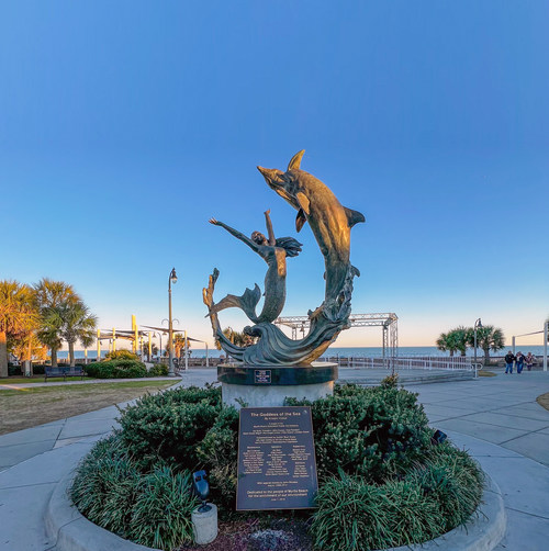 The Goddess of the Sea, located at Plyler Park, is a bronze sculpture by artist Kristen Visbal and celebrates the energetic spirit of Myrtle Beach. Credit: Visit Myrtle Beach