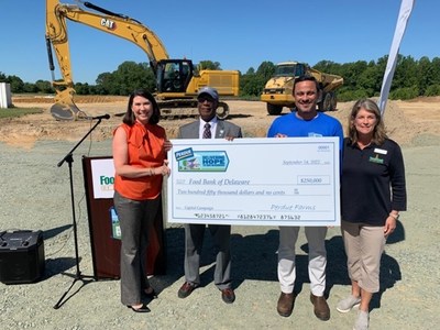 From left to right are Perdue Foundation Executive Director Kim Nechay, Milford Mayor Archie Campbell, Milford Perdue Plant Operations Director Edgardo Torres Ortiz and Food Bank of Delaware President and CEO Cathy Kanefsky