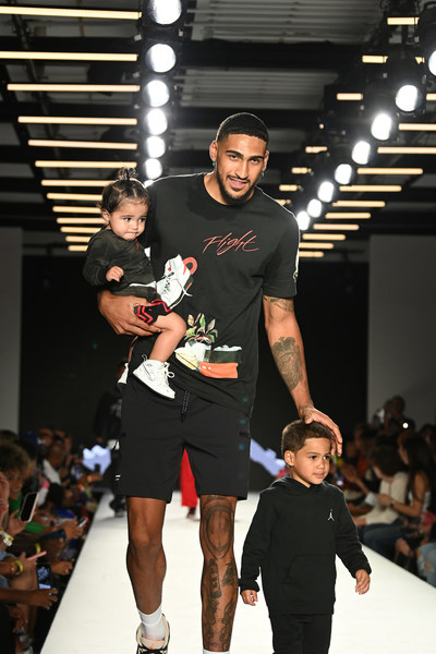 Obi Toppin and children Daniel and Remie walk the runway for Air Jordan during the 2022 Rookie USA Fashion Show at 608 Fifth Avenue on September 08, 2022 in New York City. (Photo by Slaven Vlasic/Getty Images for Rookie USA)