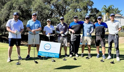 Team Smart Circle on the green at the 12th Annual NEGU Golf Classic.