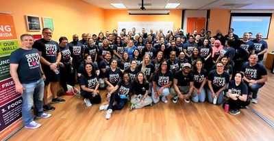 ChenMed team members volunteering at Feeding South Florida, Wednesday, September 7, in Pembroke Pines, FL, as part of the organization’s “Serving and Giving Day” of community service.