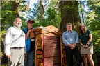 Parks Canada and Huu-ay-aht First Nations gather to officially reveal a plaque honouring Kiix̣in Village and Fortress National Historic Site