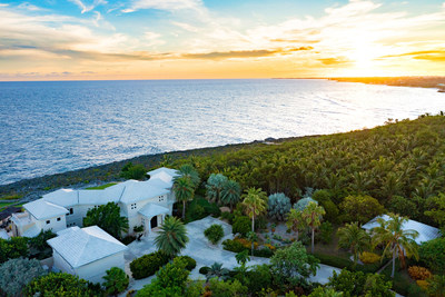 Vistas from the property include unobstructed expanses of the sparkling Caribbean Sea and Spotts' Beach, in addition to spectacular sunsets. Lush landscaping throughout the grounds augments privacy. Details at CaymanLuxuryAuction.com.