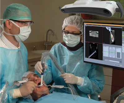 Dentist using Image Navigation's IGI 2.0 dual Surgical Navigation & Robotic System for Dental Implantology.